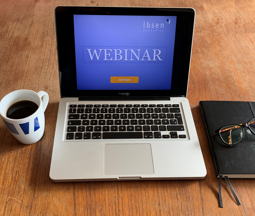 Picture of a laptop showing "Webinar" on the screen